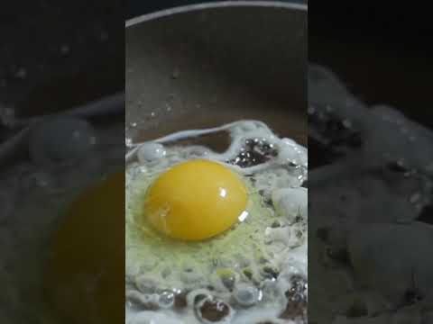 Mesmerizing Egg Cooking: Watch Eggs Sizzle and Transform!